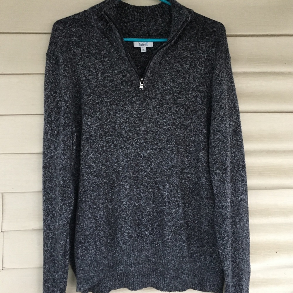Mens long sleeve sweater with zipper up collar.